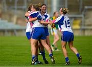 29 August 2015; Waterford players, from left, Caoimhe McGrath, Sinéad Ryan, Louise Ryan and Mary Foley celebrate after their victory. TG4 Ladies Football All-Ireland Intermediate Championship, Semi-Final, Leitrim v Waterford, Gaelic Grounds, Limerick. Picture credit: Piaras Ó Mídheach / SPORTSFILE