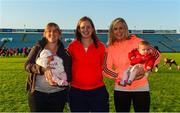 29 August 2015; Cork players, from left, Elaine Harte, with her daugher Aoibheann Doyle, Ann Marie Walsh and Angela Walsh, with her daughter Keeva, at the game. TG4 Ladies Football All-Ireland Senior Championship, Semi-Final, Cork v Kerry, Gaelic Grounds, Limerick. Picture credit: Piaras Ó Mídheach / SPORTSFILE