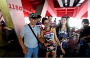 30 August 2015; Sinead Diver, from Belmullet, Co. Mayo, representing Australia, with locals following the Women's Marathon event where she finished in 21st place. IAAF World Athletics Championships Beijing 2015 - Day 9, National Stadium, Beijing, China. Picture credit: Stephen McCarthy / SPORTSFILE