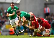 29 August 2015; Robbie Henshaw, Ireland, is tackled by Dan Biggar, Wales. Rugby World Cup Warm-Up Match, Ireland v Wales, Aviva Stadium, Lansdowne Road, Dublin. Picture credit: Ramsey Cardy / SPORTSFILE