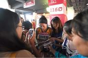 30 August 2015; Sinead Diver, from Belmullet, Co. Mayo, representing Australia, with locals following the Women's Marathon event where she finished in 21st place. IAAF World Athletics Championships Beijing 2015 - Day 9, National Stadium, Beijing, China. Picture credit: Stephen McCarthy / SPORTSFILE