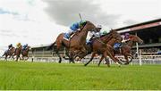 30 August 2015; Beacon Rock, front right, with Joseph O'Brien up, leads, from left, Stellar Mass, with Kevin Manning up, who finished third, Precious Gold, with Leigh Roche up, who finished second, and Afzal, with Shane Foley up, who finished fourth, on their way to winning the Irish Stallion Farms European Breeders Fund. Curragh Racecourse, Curragh, Co. Kildare. Picture credit: Cody Glenn / SPORTSFILE