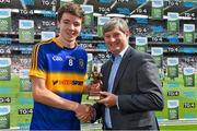 30 August 2015; Representing Electric Ireland, proud sponsor of the GAA All-Ireland Minor Championships, is Pat O'Doherty, Chief Executive, ESB, presenting Jack Kennedy, from Tipperary, with the Player of the Match award for his outstanding performance in the Electric Ireland GAA Minor Football Championship Semi-Final, Kildare vs Tipperary in Croke Park. Throughout the Championship fans can follow the action, support the Minors and be a part of something major through the hashtag #ThisIsMajor. Croke Park, Dublin. Picture credit: Brendan Moran / SPORTSFILE