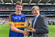 30 August 2015; Representing Electric Ireland, proud sponsor of the GAA All-Ireland Minor Championships, is Pat O'Doherty, Chief Executive, ESB, presenting Jack Kennedy, from Tipperary, with the Player of the Match award for his outstanding performance in the Electric Ireland GAA Minor Football Championship Semi-Final, Kildare vs Tipperary in Croke Park. Throughout the Championship fans can follow the action, support the Minors and be a part of something major through the hashtag #ThisIsMajor. Croke Park, Dublin. Picture credit: Brendan Moran / SPORTSFILE