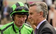 30 August 2015; Trainer Jim Bolger with Kevin Manning in the parade ring after Manning rode Smash Williams to victory in the Round Tower Stakes. Curragh Racecourse, Curragh, Co. Kildare. Picture credit: Cody Glenn / SPORTSFILE