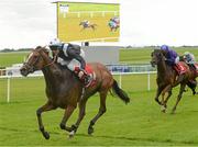 30 August 2015; Hint Of A Tint, with Fran Berry up, cross the finish line to win the Tote Irish Cambridgeshire. Curragh Racecourse, Curragh, Co. Kildare. Picture credit: Cody Glenn / SPORTSFILE