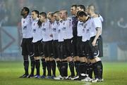 24 February 2009; The Dundalk team stand for a minute silence before the start of the game. Pre-Season Friendly, Drogheda United v Dundalk. United Park, Drogheda. Picture credit: David Maher / SPORTSFILE