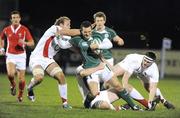 27 February 2009; Dave Kearney, Ireland U20, is tackled by James Gaskell, left, and Calum Clarke, England U20. U20 Six Nations Championship, Ireland U20 v England U20, Dubarry Park, Athlone, Co. Westmeath. Picture credit: Oliver McVeigh / SPORTSFILE