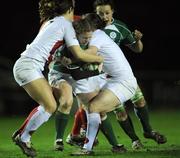 27 February 2009; Grace Davitt, Ireland, is tackled by Gemma Sharples, left, and Katy McClean, England. Women's 6 Nations, Ireland v England, Templeville Road, Dublin. Picture credit: Brian Lawless / SPORTSFILE