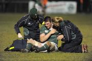 27 February 2009; Ireland U20 captain Peter O'Mahony receives treatment in the second-half before leaving the field injured. U20 Six Nations Championship, Ireland U20 v England U20, Dubarry Park, Athlone, Co. Westmeath. Picture credit: Oliver McVeigh / SPORTSFILE