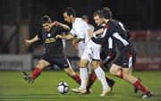 27 February 2009; Neal Fenn, Bohemians, in action against Shelbourne players, from left, David McAllister, Mark O'Brien and Alan Keeley. Pre-Season Friendly, Bohemians v Shelbourne, Dalymount Park, Dublin. Picture credit: Stephen McCarthy / SPORTSFILE *** Local Caption ***