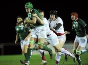 27 February 2009; Orla Brennan, Ireland, is tackled by Katy McClean, left, and Rochelle Clarke, England. Women's 6 Nations, Ireland v England, Templeville Road, Dublin. Picture credit: Brian Lawless / SPORTSFILE *** Local Caption ***