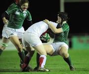 27 February 2009; Louise Austin and Grace Davitt, left, Ireland, in action against Rochelle Clarke, England. Women's 6 Nations, Ireland v England, Templeville Road, Dublin. Picture credit: Brian Lawless / SPORTSFILE *** Local Caption ***