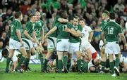 28 February 2009; Ireland captain Brian O'Driscoll, 13, is congratulated by team-mates after scoring his side's first try. RBS Six Nations Rugby Championship, Ireland v England, Croke Park, Dublin. Picture credit: Brendan Moran / SPORTSFILE *** Local Caption ***