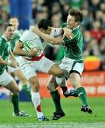 28 February 2009; Riki Flutey, England, is tackled by Brian O'Driscoll, Ireland. RBS Six Nations Rugby Championship, Ireland v England, Croke Park, Dublin. Picture credit: David Maher / SPORTSFILE