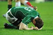 28 February 2009; Ireland captain Brian O'Driscoll goes down with an injury during the second half. RBS Six Nations Rugby Championship, Ireland v England, Croke Park, Dublin. Picture credit: Brendan Moran / SPORTSFILE