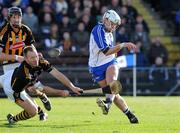 1 March 2009; Stephen Molumphy, Waterford, shoots past Kilkenny goalkeeper PJ Ryan and Sean Cummins,18, to score the first goal of the game. Allianz GAA National Hurling League, Division 1, Round 3, Waterford v Kilkenny, Walsh Park, Waterford. Picture credit: Matt Browne / SPORTSFILE