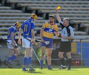 1 March 2009; Referee John Sexton shows a yellow card to Clare's Tony Griffin, 10. Allianz GAA National Hurling League, Division 1, Round 3, Tipperary v Clare, Semple Stadium, Thurles, Co. Tipperary. Picture credit: Brendan Moran / SPORTSFILE