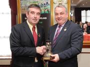 28 February 2009; Tom Daly Ulster Council President presents GAA President Nickey Brennan with a gift at the Ulster Council GAA convention. Ulster Council GAA Convention, Dorrians Imperial Hotel, Ballyshannon, Co. Donegal. Picture credit: Oliver McVeigh / SPORTSFILE  *** Local Caption ***