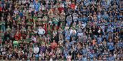 30 August 2015; Both Dublin and Mayo supporters stand in the Cusack Stand and applaud former Mayo minor footballer Darragh Doherty during the thirteenth minute. GAA Football All-Ireland Senior Championship, Semi-Final, Dublin v Mayo, Croke Park, Dublin. Picture credit: Dáire Brennan / SPORTSFILE