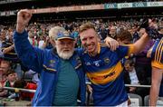 30 August 2015; Seamus Fahy from New Inn, Co. Tipperary celebrates with Liam Fahy, Tipperary, after the game. Electric Ireland GAA Football All-Ireland Minor Championship, Semi-Final, Kildare v Tipperary, Croke Park, Dublin. Photo by Sportsfile