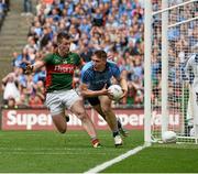 30 August 2015; John Small, Dublin, runs out from goal under the challange from Cillian O'Connor, Mayo after saving a goal on the line. GAA Football All-Ireland Senior Championship, Semi-Final, Dublin v Mayo, Croke Park, Dublin. Picture credit: David Maher / SPORTSFILE