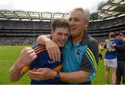 30 August 2015; Tommy Lowry, Tipperary, celebrates with manager Charlie McGeever after the game. Electric Ireland GAA Football All-Ireland Minor Championship, Semi-Final, Kildare v Tipperary, Croke Park, Dublin. Photo by Sportsfile