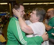 30 August 2015: Ireland's Stephen Barry is greeted by his mother Amy at Dublin Airport. The Irish Hockey team arrived home into Dublin Airport with a Bronze medal after defeating England in the Eurohockey Championships in London, England. Dublin Airport, Dublin. Picture credit: Ray Lohan / SPORTSFILE