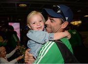 30 August 2015; Craig Fulton, Ireland coach, and his Daughter Lola, age 2, pictured in at arrivals at Dublin Airport. The Irish Hockey team arrived home into Dublin Airport with a Bronze medal after defeating England in the Eurohockey Championships in London, England. Picture credit: Ray Lohan / SPORTSFILE