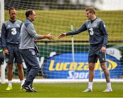 31 August 2015; Republic of Ireland manager Martin O'Neill shakes hands with James McClean, during squad training. Republic of Ireland Squad Training, Abbotstown, Co. Dublin. Picture credit: David Maher / SPORTSFILE