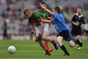30 August 2015; Kieran Feerick, The Neale NS, Ballinrobe, Mayo, in action against Darragh Farrell, Edenderry BNS, Edenderry, Offaly, representing Dublin,  during the Cumann na mBunscol INTO Respect Exhibition Go Games 2015 at Dublin v Mayo - GAA Football All-Ireland Senior Championship Semi-Final. Croke Park, Dublin. Picture credit: Ray McManus / SPORTSFILE