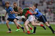 30 August 2015; Kieran Feerick, The Neale NS, Ballinrobe, Mayo, in action against Darragh Farrell, Edenderry BNS, Edenderry, Offaly, representing Dublin,  during the Cumann na mBunscol INTO Respect Exhibition Go Games 2015 at Dublin v Mayo - GAA Football All-Ireland Senior Championship Semi-Final. Croke Park, Dublin. Picture credit: Ray McManus / SPORTSFILE