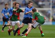 30 August 2015; Darragh Farrell, Edenderry BNS, Edenderry, Offaly, representing Dublin, in action against Cian Moore, Ballyadams NS, via Athy, Kildare, representing Mayo, left, and Sam McGuirk, Ballysax NS, The Curragh, Kildare, representing Mayo during the Cumann na mBunscol INTO Respect Exhibition Go Games 2015 at Dublin v Mayo - GAA Football All-Ireland Senior Championship Semi-Final. Croke Park, Dublin. Picture credit: Ray McManus / SPORTSFILE