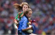 30 August 2015; Breda Cushen, Kiltealy NS, Enniscorthy, Wexford, representing Dublin, in action against Emily Conlon, St. Clare’s PS, Manorhamilton, Leitrim, representing Mayo, during the Cumann na mBunscol INTO Respect Exhibition Go Games 2015 at Dublin v Mayo - GAA Football All-Ireland Senior Championship Semi-Final. Croke Park, Dublin. Picture credit: Ray McManus / SPORTSFILE