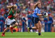 30 August 2015; Katie Kehoe, Horeswood NS, Campile, New Ross, Wexford, representing Dublin, in action against Hazel O'Reilly-Higgins, Baconstown, NS, Enfield, Meath, representing Mayo, during the Cumann na mBunscol INTO Respect Exhibition Go Games 2015 at Dublin v Mayo - GAA Football All-Ireland Senior Championship Semi-Final. Croke Park, Dublin. Picture credit: Ray McManus / SPORTSFILE