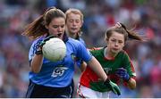 30 August 2015; Sarah Dolan, Ballybay Central NS, Kiltoom, Athlone, Roscommon, representing Dublin, in action against Kaitlyn Cowdell, St. Joseph’s NS, Carrigallen, Leitrim, representing Mayo, during the Cumann na mBunscol INTO Respect Exhibition Go Games 2015 at Dublin v Mayo - GAA Football All-Ireland Senior Championship Semi-Final. Croke Park, Dublin. Picture credit: Ray McManus / SPORTSFILE