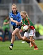 30 August 2015; Cliona Walsh, St Patrick’s NS, Calry, Sligo, representing Mayo, in action against Róisín Bailey, Ballyconnell NS, Tullow, Carlow, representing Dublin, during the Cumann na mBunscol INTO Respect Exhibition Go Games 2015 at Dublin v Mayo - GAA Football All-Ireland Senior Championship Semi-Final. Croke Park, Dublin. Photo by Sportsfile