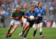 30 August 2015; Dearbhla Tinnelly, St. Mary’s NS, Knockbridge, Dundalk, Louth, representing Dublin, in action against Shona Neary, Ardnagrath NS, Athlone, Westmeath, representing Mayo, during the Cumann na mBunscol INTO Respect Exhibition Go Games 2015 at Dublin v Mayo - GAA Football All-Ireland Senior Championship Semi-Final. Croke Park, Dublin. Photo by Sportsfile