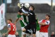 31 August 2015; St Patrick's Athletic goalkeeper Brendan Clarke in action against Mark O'Sullivan, Cork City. SSE Airtricity League Premier Division, Cork City v St Patrick's Athletic, Turner's Cross, Cork. Picture credit: Diarmuid Greene / SPORTSFILE