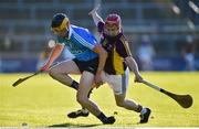 1 June 2016; Cian Hendricken of Dublin in action against Darragh Pepper of Wexford during the Bord Gáis Energy Leinster GAA Hurling U21 Championship, Quarter-Final, between Wexford and Dublin in Innovate Wexford Park. Photo by Matt Browne/Sportsfile