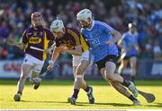 1 June 2016; Cathal Dunbar of Wexford in action against Shane Barrett of Dublin during the Bord Gáis Energy Leinster GAA Hurling U21 Championship, Quarter-Final, between Wexford and Dublin in Innovate Wexford Park. Photo by Matt Browne/Sportsfile