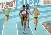 6 March 2009; Ireland's Bronagh Furlong, left, and Marian Andrews, trail behind Donna Fraser of Great Britain on their way to finishing 5th and 4th respectively but failing to make the final. European Indoor Athletics Championships, Oval Lingotto, Torino, Italy. Picture credit: Brendan Moran / SPORTSFILE *** Local Caption ***