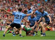 30 August 2015; Colm Boyle, Mayo, surrounded by Dublin players, from left, Michael Fitzsimons, 21, left, Jack McCaffrey, Tomás Brady, 17, Philly McMahon, 4, Paul Flynn, 10, and far right John Small, after being foulded inside the penalty area. GAA Football All-Ireland Senior Championship, Semi-Final, Dublin v Mayo, Croke Park, Dublin. Picture credit Tomás Greally / SPORTSFILE