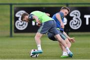 1 September 2015; Eunan O'Kane, Republic of Ireland, in action against team-mate Alex Pearce during squad training. Republic of Ireland Squad Training, Abbotstown, Co. Dublin. Picture credit: David Maher / SPORTSFILE