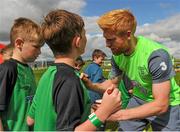 1 September 2015; Paul McShane, Republic of Ireland, gives autographs to participants during the FAI Golden Camp, a summer camp run by the FAI for season ticket holders who participated in the Sports World Summer Soccer Schools Programme. Abbotstown, Co. Dublin. Picture credit: Sam Barnes / SPORTSFILE