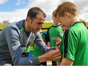 1 September 2015; John O'Shea, Republic of Ireland, gives autographs to participants during the FAI Golden Camp, a summer camp run by the FAI for season ticket holders who participated in the Sports World Summer Soccer Schools Programme. Abbotstown, Co. Dublin. Picture credit: Sam Barnes / SPORTSFILE