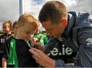 1 September 2015; James McCarthy, Republic of Ireland, gives autographs to participants during the FAI Golden Camp, a summer camp run by the FAI for season ticket holders who participated in the Sports World Summer Soccer Schools Programme. Abbotstown, Co. Dublin. Picture credit: Sam Barnes / SPORTSFILE