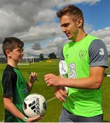 1 September 2015; Kevin Doyle, Republic of Ireland, gives autographs to participants during the FAI Golden Camp, a summer camp run by the FAI for season ticket holders who participated in the Sports World Summer Soccer Schools Programme. Abbotstown, Co. Dublin. Picture credit: Sam Barnes / SPORTSFILE