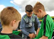 1 September 2015; Shane Long, Republic of Ireland, gives autographs to participants during the FAI Golden Camp, a summer camp run by the FAI for season ticket holders who participated in the Sports World Summer Soccer Schools Programme. Abbotstown, Co. Dublin. Picture credit: Sam Barnes / SPORTSFILE
