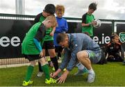 1 September 2015; James McCarthy, Republic of Ireland, gives autographs to participants during the FAI Golden Camp, a summer camp run by the FAI for season ticket holders who participated in the Sports World Summer Soccer Schools Programme. Abbotstown, Co. Dublin. Picture credit: Sam Barnes / SPORTSFILE